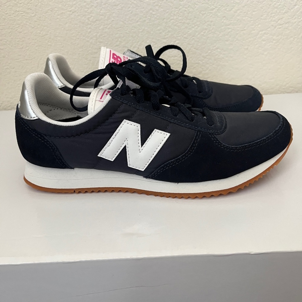 Brand new: New balance navy blue shoes. Size 7